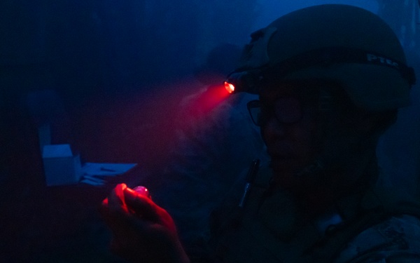 U.S. Navy Hospital Corpsman participate in the culminating event of a Combat Medical Course