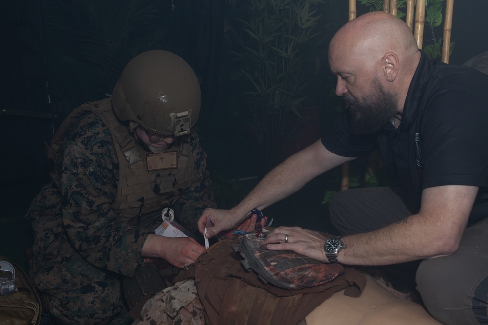 U.S. Navy Hospital Corpsman participate in the culminating event of a Combat Medical Course
