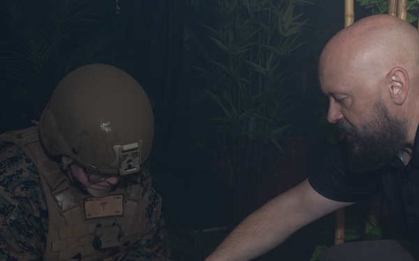 U.S. Navy Hospital Corpsman participate in the culminating event of a Combat Medical Course