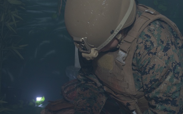 U.S. Navy Hospital Corpsman participate in the culminating event of a Combat Medical Course