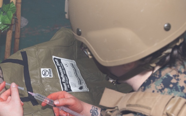 U.S. Navy Hospital Corpsman participate in the culminating event of a Combat Medical Course