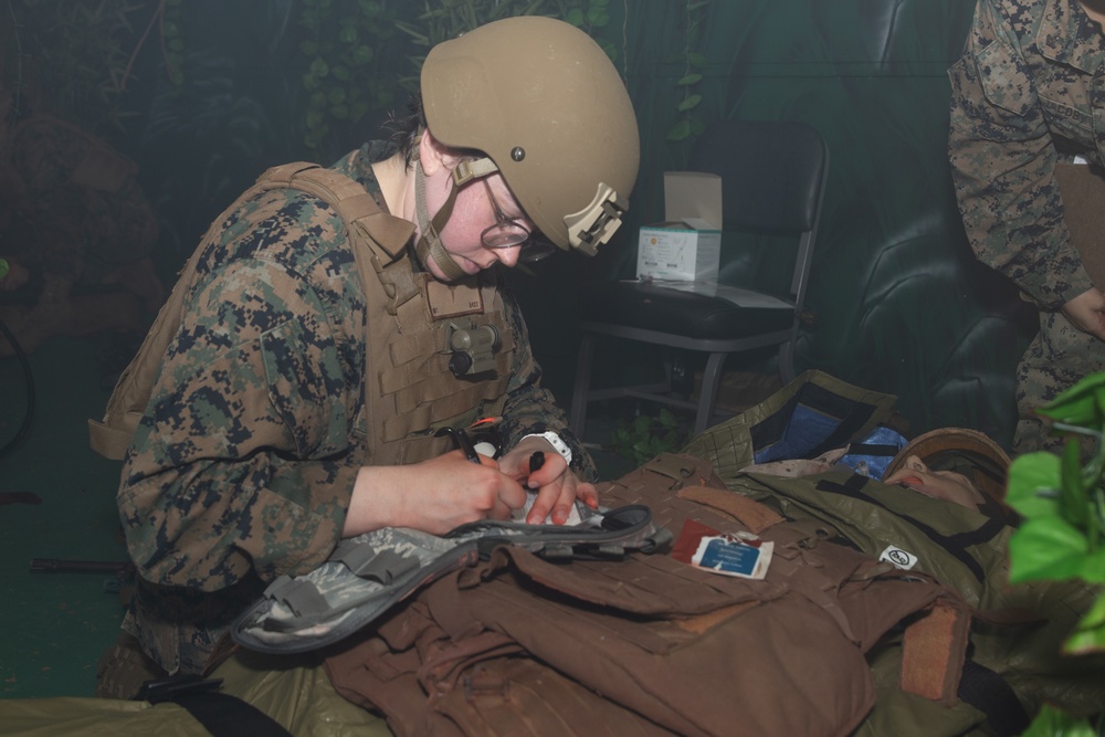 U.S. Navy Hospital Corpsman participate in the culminating event of a Combat Medical Course