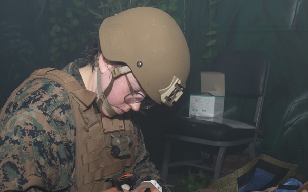 U.S. Navy Hospital Corpsman participate in the culminating event of a Combat Medical Course