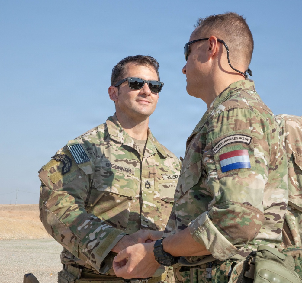 Coalition Forces test their mettle for a Dutch Qualification Badge