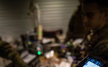 U.S. Sailors use battlefield assisted trauma documentation kit for simulated casualty during European deployment