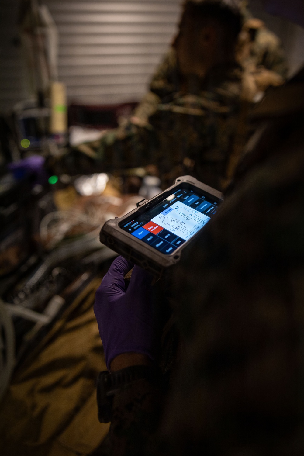 U.S. Sailors use battlefield assisted trauma documentation kit for simulated casualty during European deployment