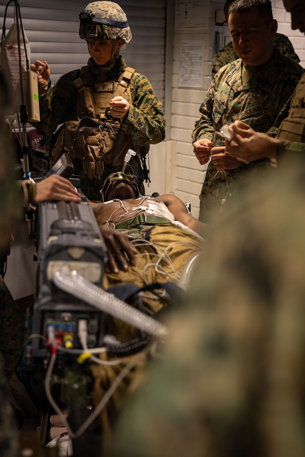 U.S. Sailors use battlefield assisted trauma documentation kit for simulated casualty during European deployment