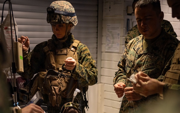 U.S. Sailors use battlefield assisted trauma documentation kit for simulated casualty during European deployment