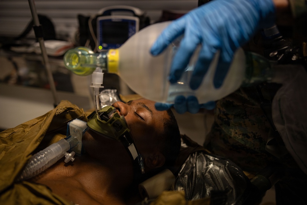 U.S. Sailors use battlefield assisted trauma documentation kit for simulated casualty during European deployment