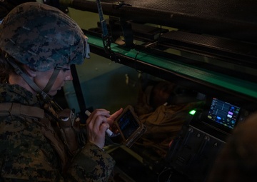 U.S. Sailors use battlefield assisted trauma documentation kit for simulated casualty during European deployment