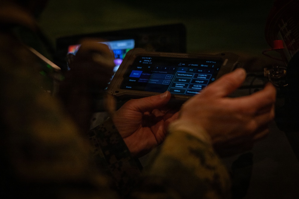 U.S. Sailors use battlefield assisted trauma documentation kit for simulated casualty during European deployment