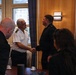 Cmdr. Joseph Phillips, commanding officer, USS Paul Ignatius (DDG 117) meets with French Navy Rear Adm. Vincent Gregoire and Capt. Pierre Suleau