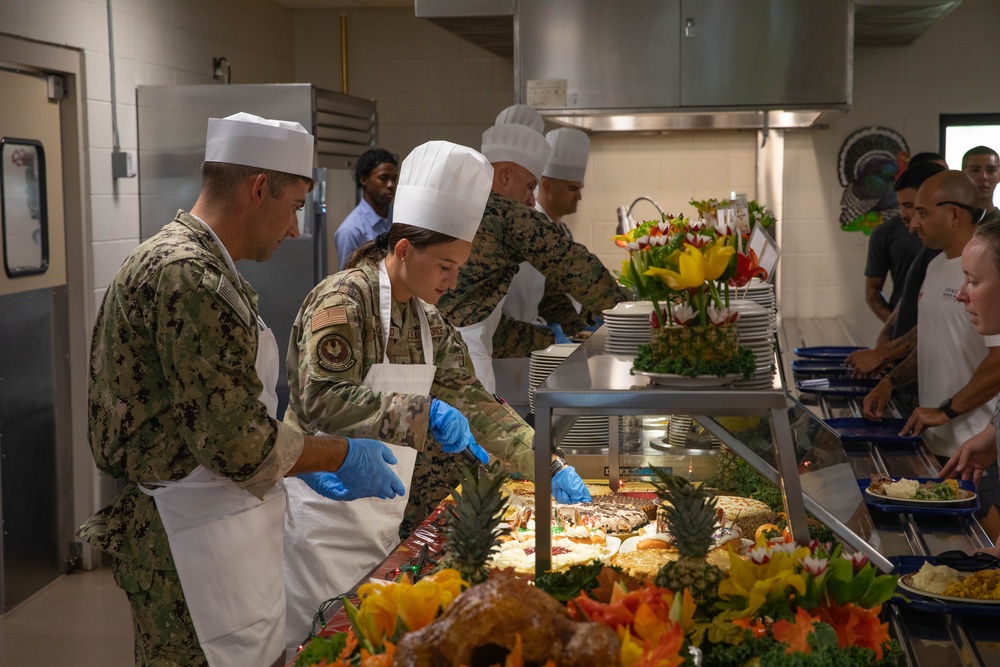 Joint Task Force Southern Guard leadership serves a Thanksgiving meal to service members