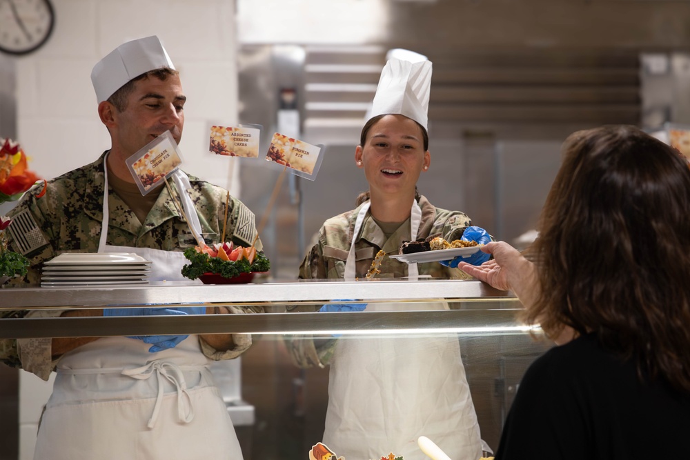 Joint Task Force Southern Guard leadership serves a Thanksgiving meal to service members