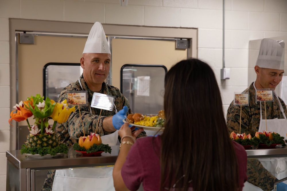 Joint Task Force Southern Guard leadership serves a Thanksgiving meal to service members