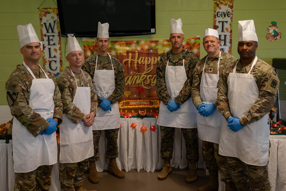 Joint Task Force Southern Guard leadership serves a Thanksgiving meal to service members