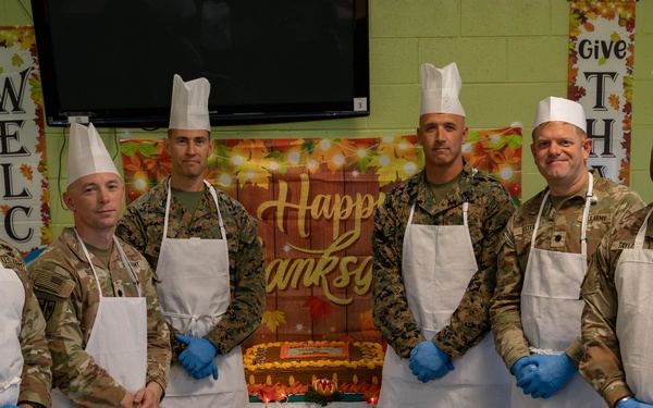 Joint Task Force Southern Guard leadership serves a Thanksgiving meal to service members