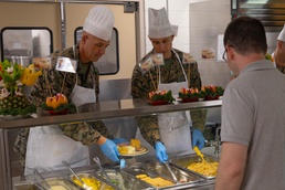 Joint Task Force Southern Guard leadership serves a Thanksgiving meal to service members