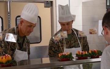 Joint Task Force Southern Guard leadership serves a Thanksgiving meal to service members
