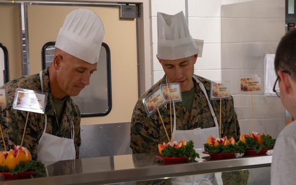 Joint Task Force Southern Guard leadership serves a Thanksgiving meal to service members