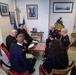 Cmdr. Joseph Phillips, commanding officer, USS Paul Ignatius (DDG 117) meets with French Navy Rear Adm. Vincent Gregoire and Capt. Pierre Suleau