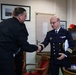 Cmdr. Joseph Phillips, commanding officer, USS Paul Ignatius (DDG 117) meets with French Navy Rear Adm. Vincent Gregoire and Capt. Pierre Suleau