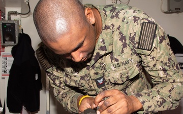 Ronald Reagan Sailors Conduct Maintenance