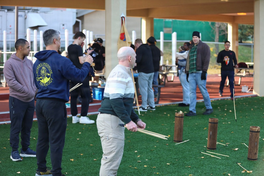 Competitors try traditional Korean games