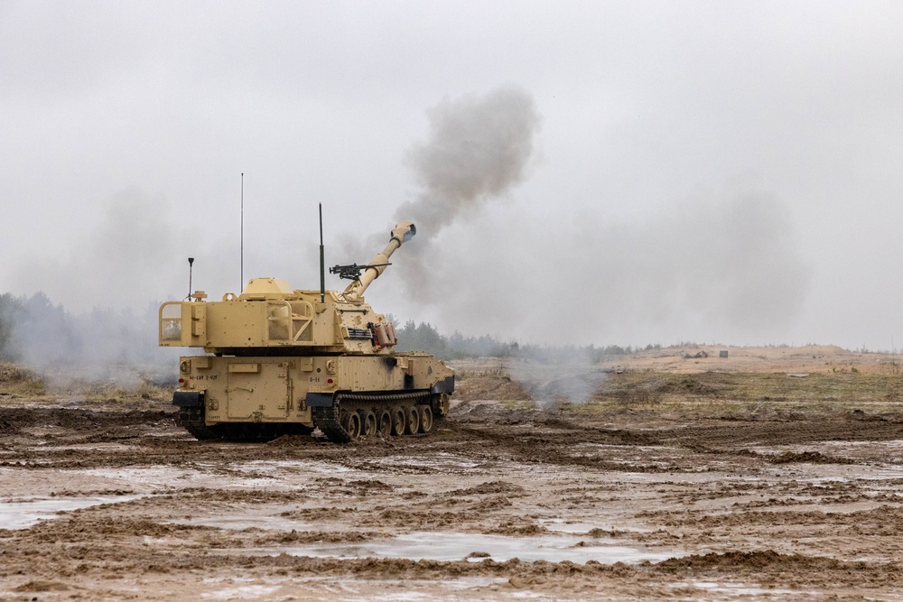 U.S. Soldiers fire a M109A7 Paladin Self-Propelled Howitzer