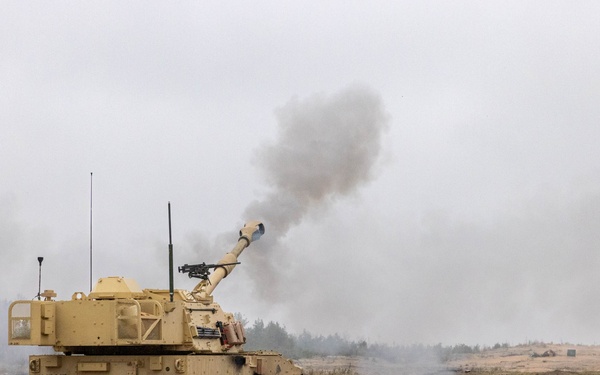 U.S. Soldiers fire a M109A7 Paladin Self-Propelled Howitzer