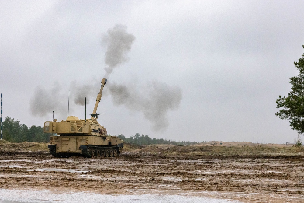 U.S. Soldiers fire a M109A7 Paladin Self-Propelled Howitzer