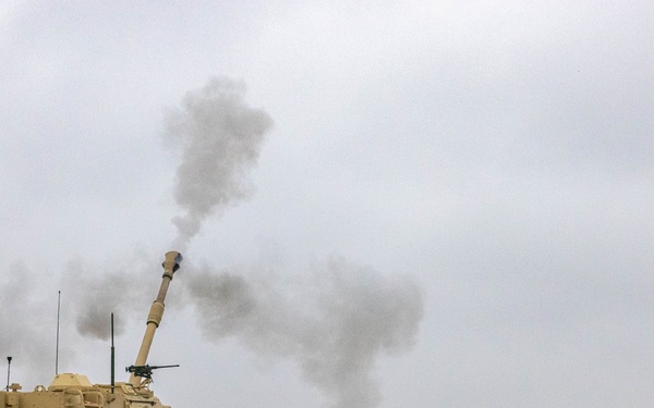 U.S. Soldiers fire a M109A7 Paladin Self-Propelled Howitzer