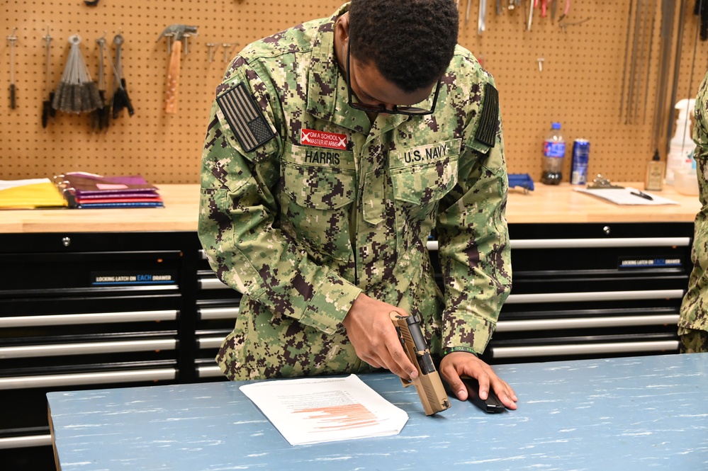 Gunner’s Mate Students Hone M-18 SIG Skills in Preparation for the Fleet
