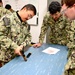 Gunner’s Mate Students Hone M-18 SIG Skills in Preparation for the Fleet