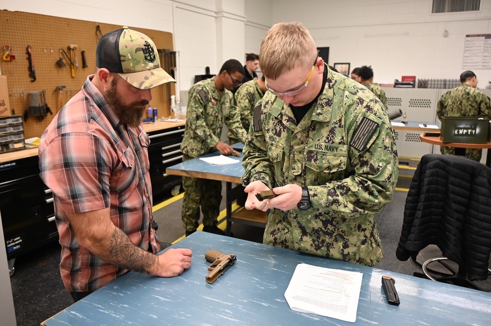 Gunner’s Mate Students Hone M-18 SIG Skills in Preparation for the Fleet