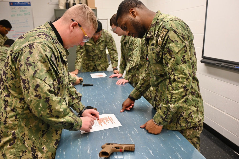 Gunner’s Mate Students Hone M-18 SIG Skills in Preparation for the Fleet