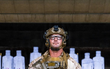 Reconnaissance Marines with the 24th Marine Expeditionary Unit conduct pistol and rifle shooting drills as a part of a modified qualification for Close Quarters Tactics training.