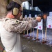 Reconnaissance Marines with the 24th Marine Expeditionary Unit conduct pistol and rifle shooting drills as a part of a modified qualification for Close Quarters Tactics training.