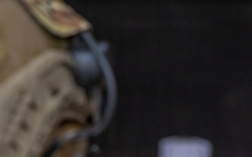 Reconnaissance Marines with the 24th Marine Expeditionary Unit conduct pistol and rifle shooting drills as a part of a modified qualification for Close Quarters Tactics training.