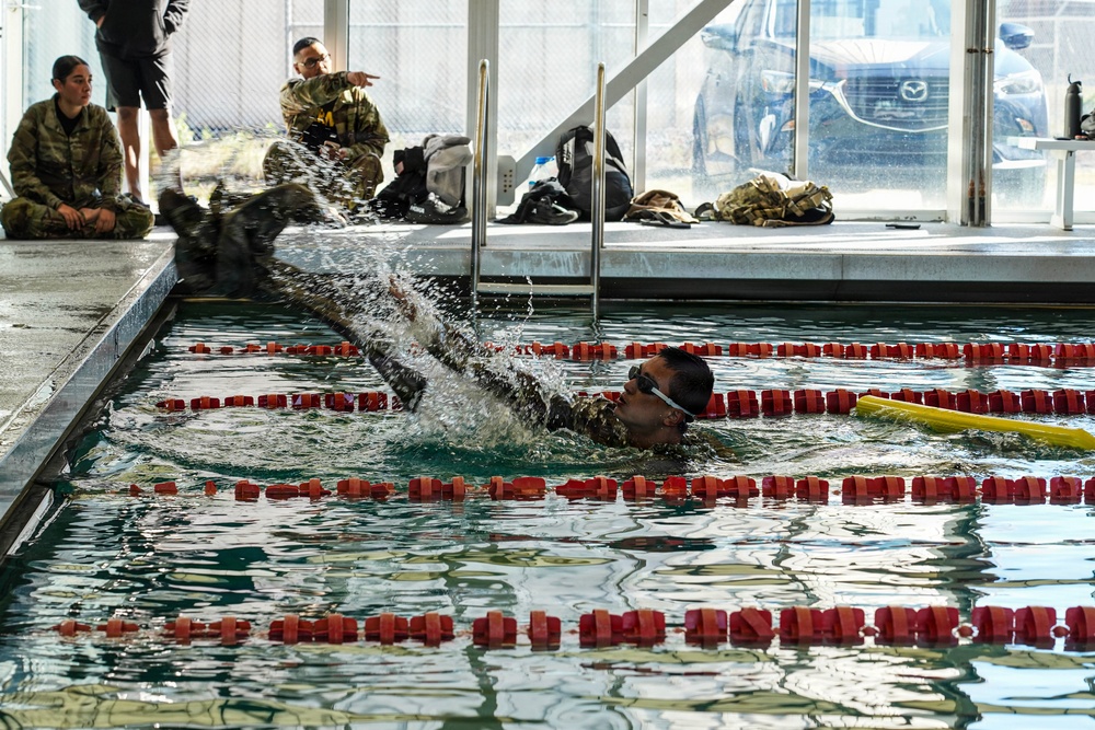 A Civil Affairs Soldier Conducts Water Survival Exercise at a German Armed Forces Proficiency Badge (GAFPB) Competition
