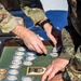 Leaders Prepare Medals for Civil Affairs Soldiers Successfully Completing the German Armed Forces Proficiency Badge (GAFPB)