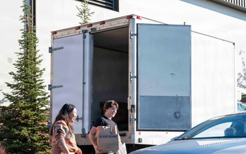 Airmen receive holiday meal kits thanks to generous donor