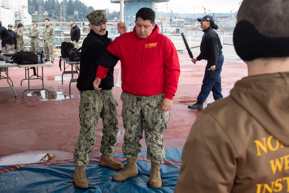 USS Ronald Reagan Sailors Complete Non-Lethal Weapons Training