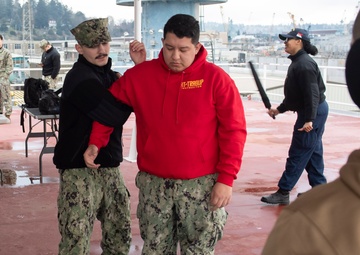 USS Ronald Reagan Sailors Complete Non-Lethal Weapons Training