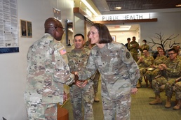 Brig. Gen. Deydre Teyhen recognized Maj. Harrison Sarpong, chief of pharmacy