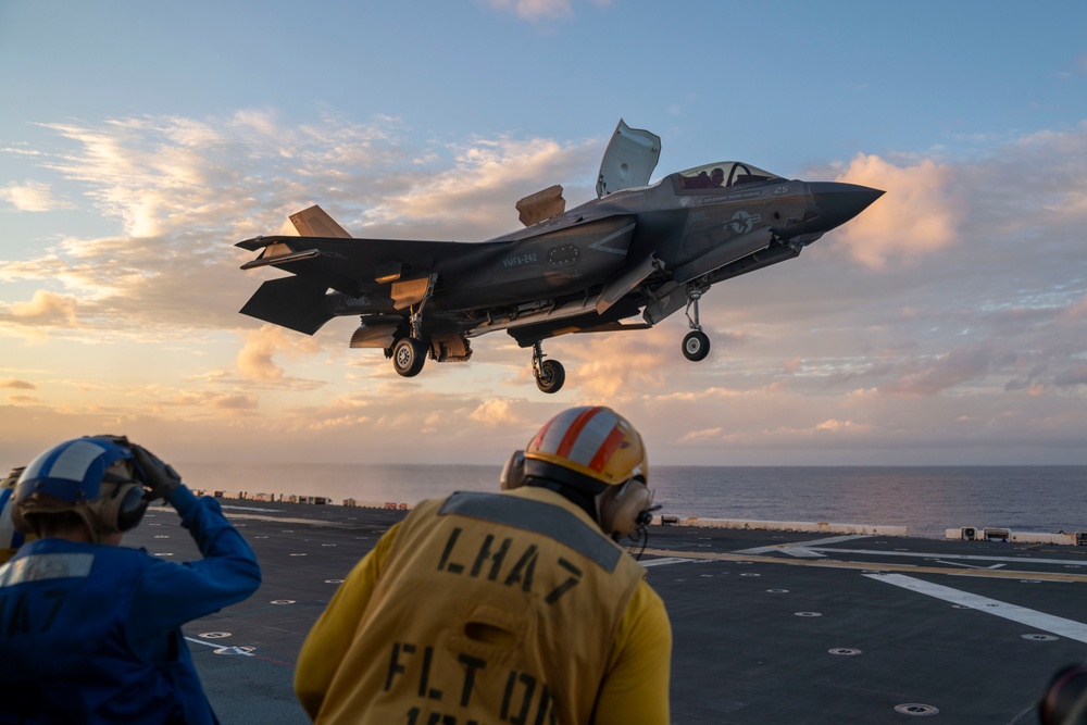 USS Tripoli Conducts Sunset Flight Operations