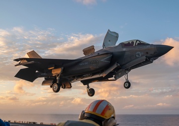 USS Tripoli Conducts Sunset Flight Operations