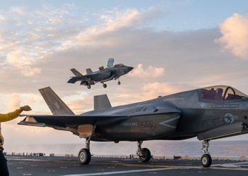 USS Tripoli Conducts Sunset Flight Operations