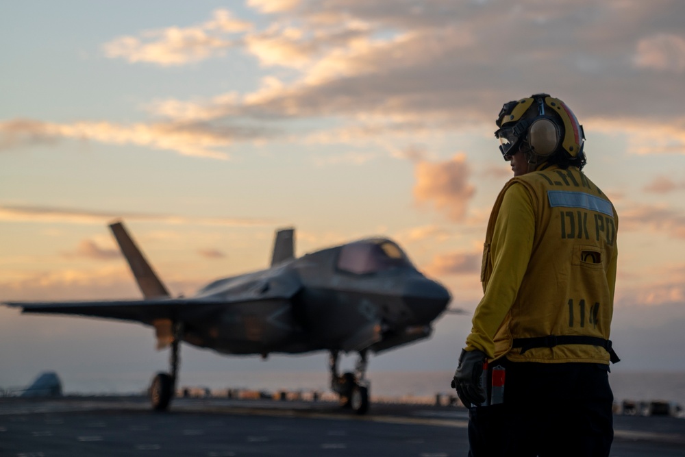 USS Tripoli Conducts Sunset Flight Operations