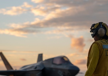 USS Tripoli Conducts Sunset Flight Operations
